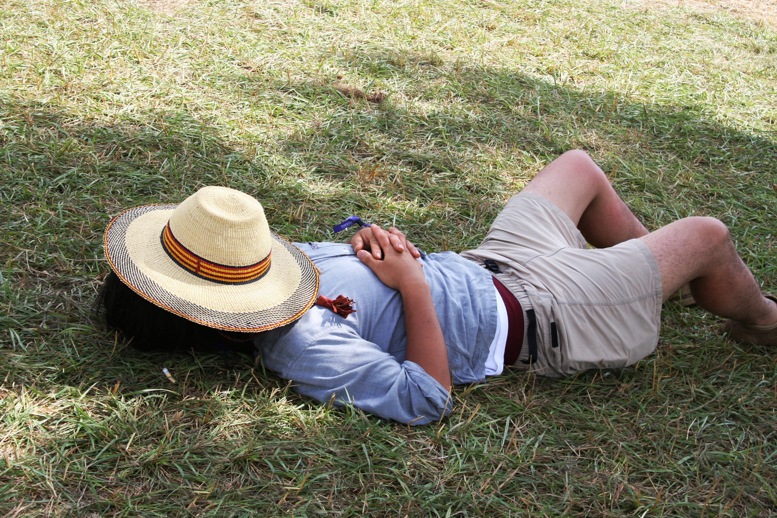 Person sleeping on a lawn