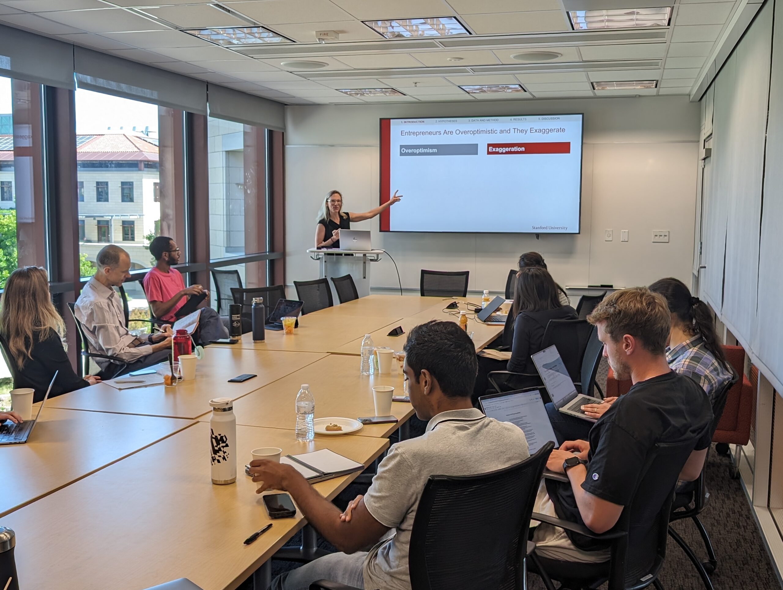 Researchers around a conference table