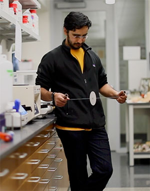 Saad Bhamla demonstrating paper centrifuge