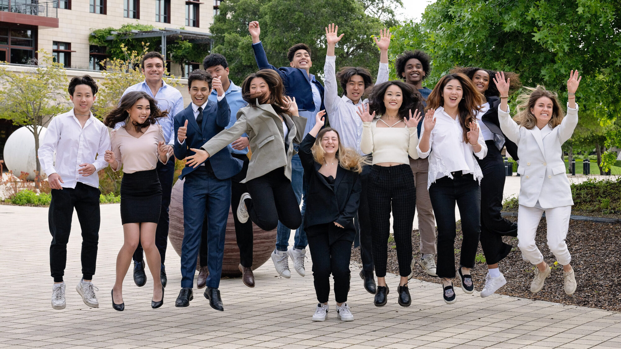 Students jumping on Stanford campus