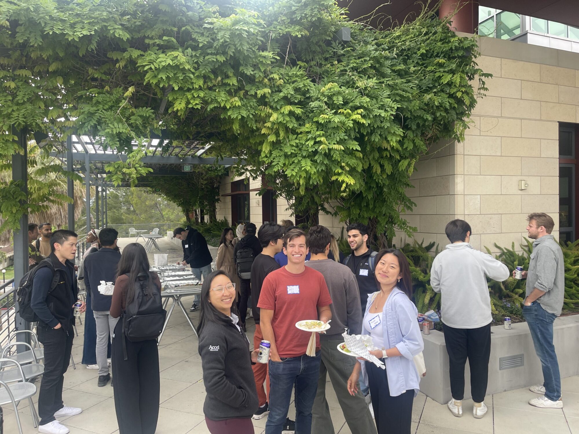 Students smiling at an event