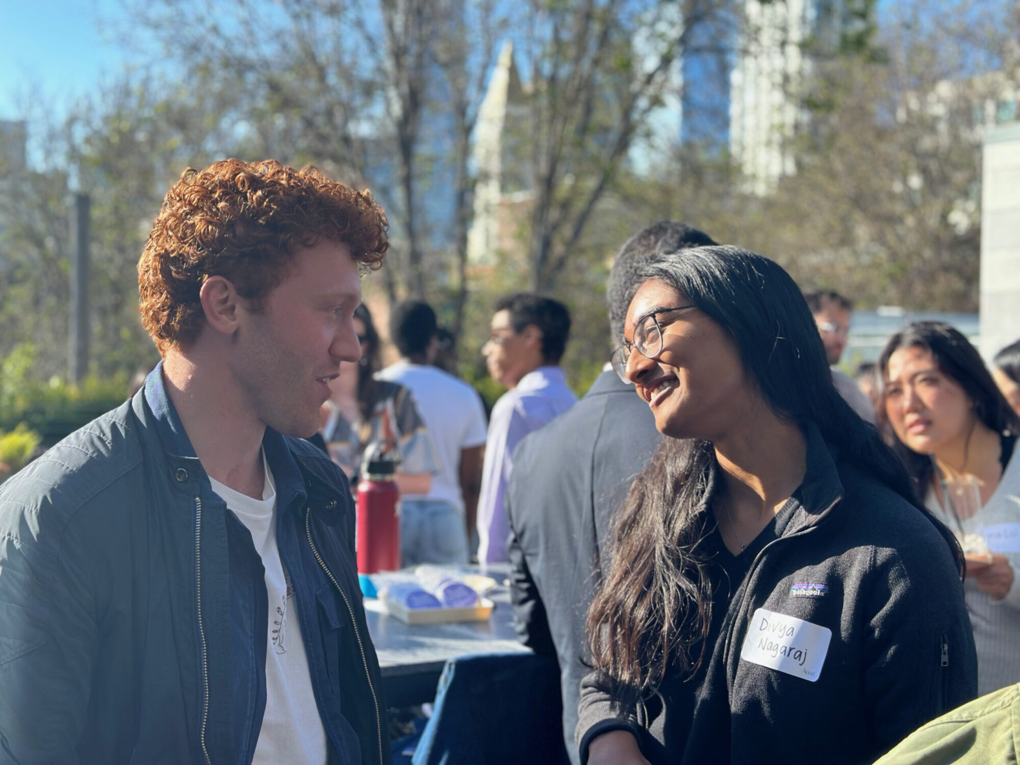 Students talking at an event