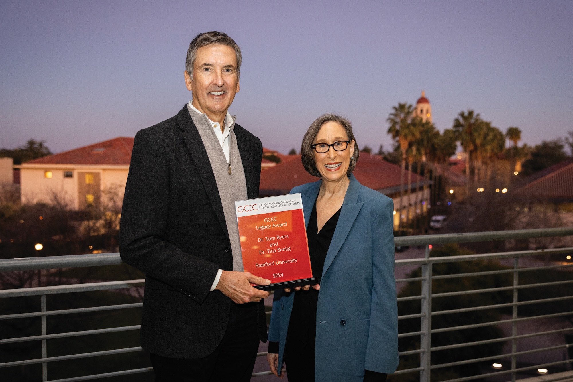 Tom Byers and Tina Seelig with award plaque